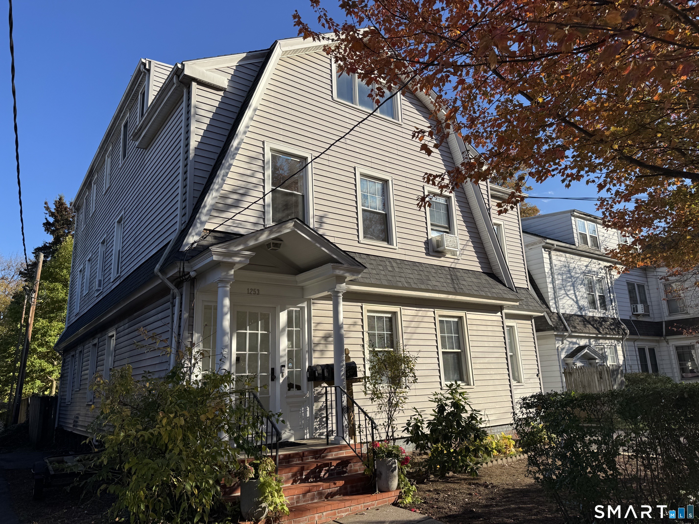1253 Forest Road, Unit 2 New Haven, CT 06515 - Photo 3 of 30 a front view of a house