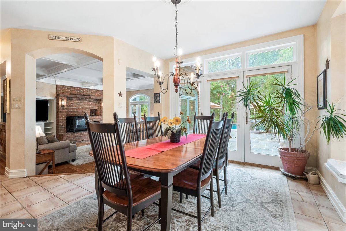 5948 White Flint Drive Frederick, MD 21702 - Photo 20 of 94 a dining room with furniture a chandelier and window