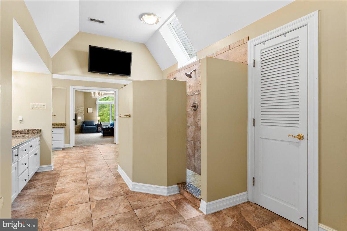 5948 White Flint Drive Frederick, MD 21702 - Photo 45 of 94 a view of a livingroom with a flat screen tv