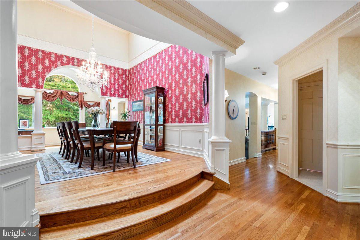 5948 White Flint Drive Frederick, MD 21702 - Photo 10 of 94 a view of a dining room with furniture and wooden floor