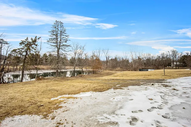 a view of pool with ocean view