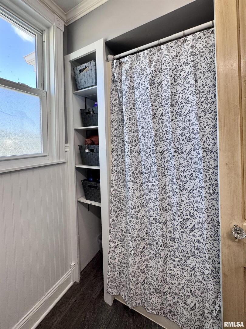 1415 4th Street Fulton, IL 61252 - Photo 55 of 58 a bathroom with a shower curtain