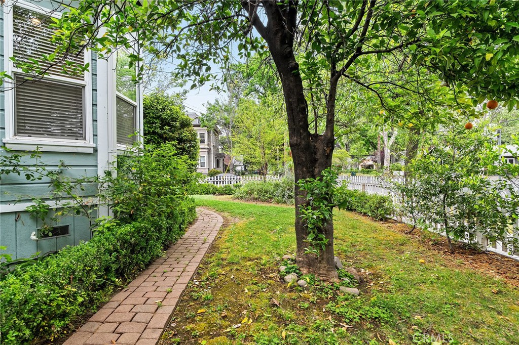 740 Orient Street Chico, CA 95928 - Photo 4 of 48 a view of a garden with pathway