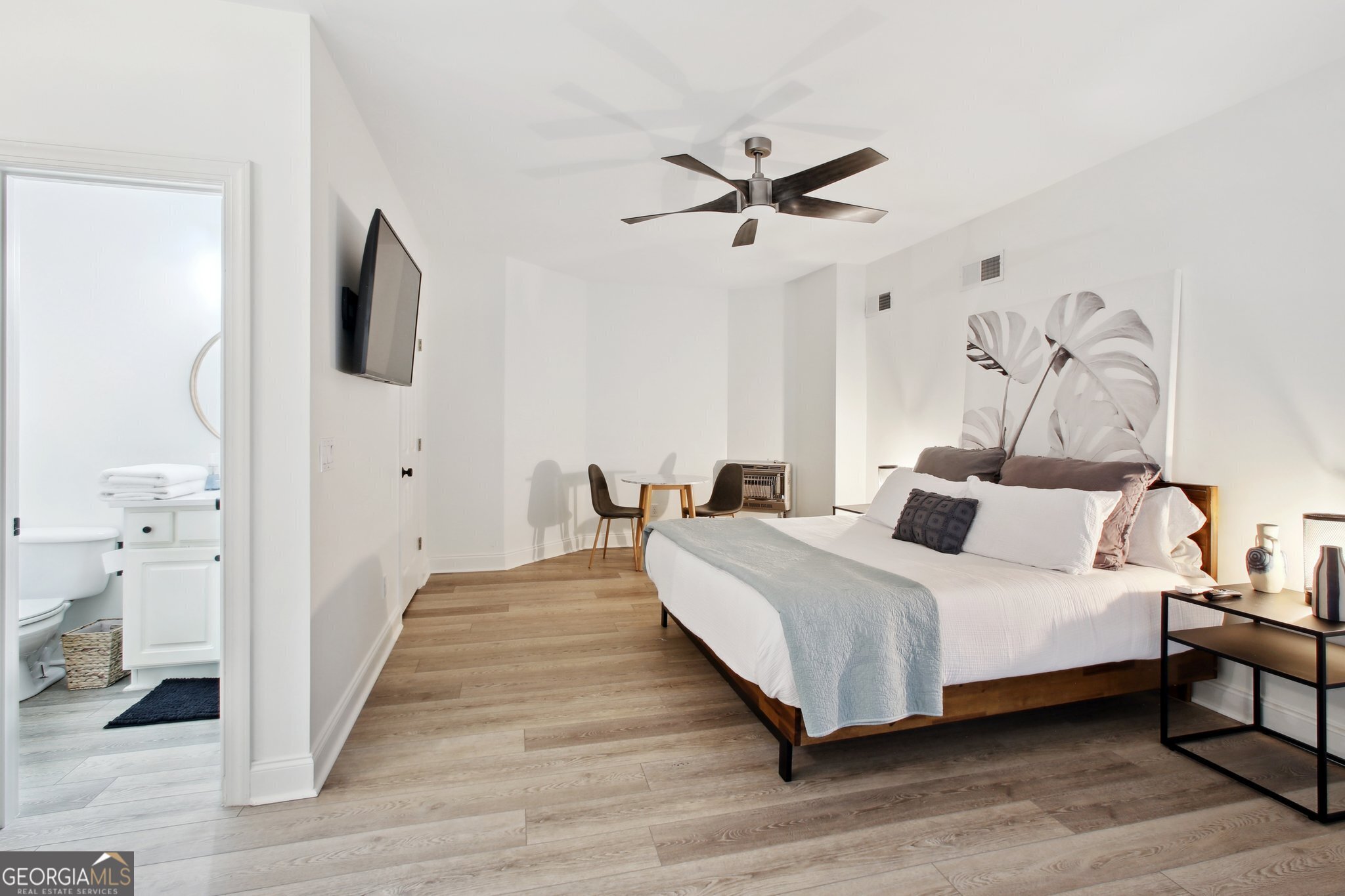 524 Forrest Avenue Fayetteville, GA 30214 - Photo 16 of 30 a bedroom with a bed and a flat screen tv