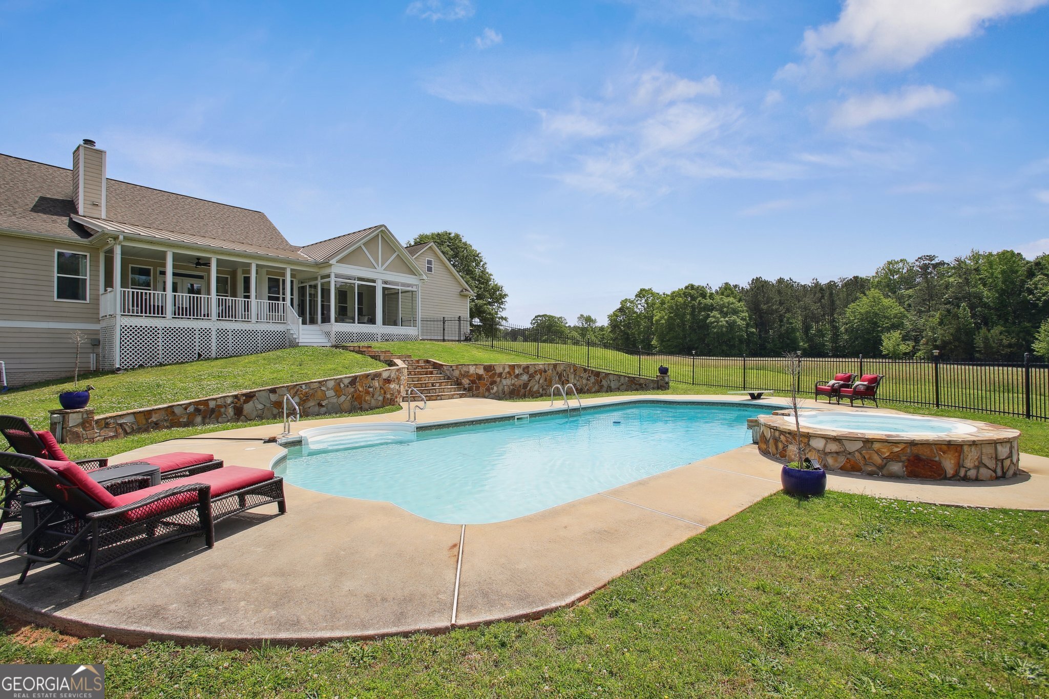 524 Forrest Avenue Fayetteville, GA 30214 - Photo 24 of 30 a view of a swimming pool with a garden