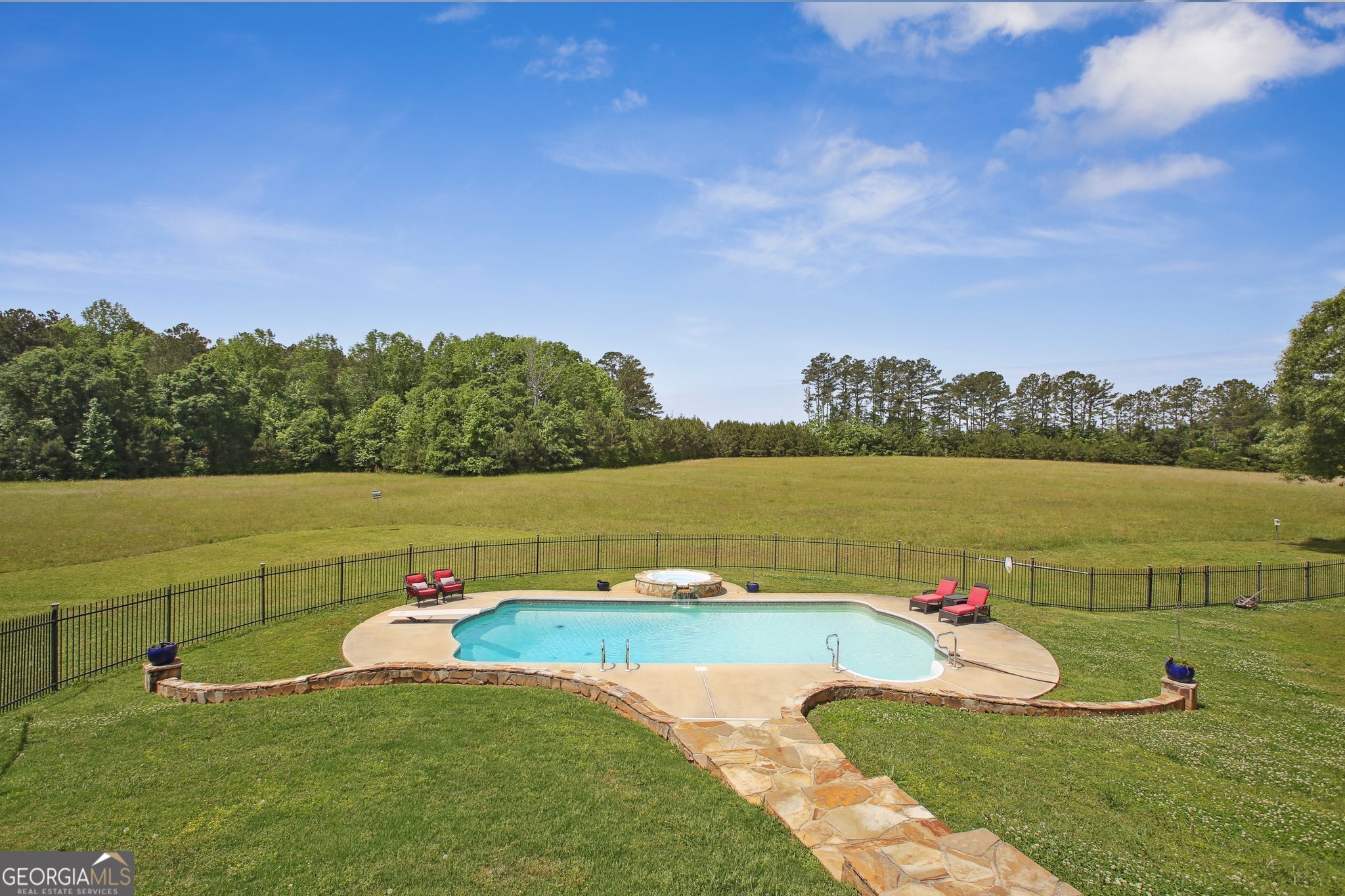 524 Forrest Avenue Fayetteville, GA 30214 - Photo 25 of 30 a view of a lake with houses in the back