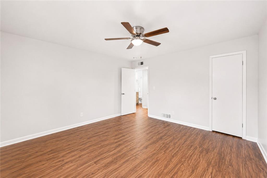 3203 East Point Street, Unit 4 Atlanta, GA 30344 - Photo 15 of 18 a view of empty room with wooden floor
