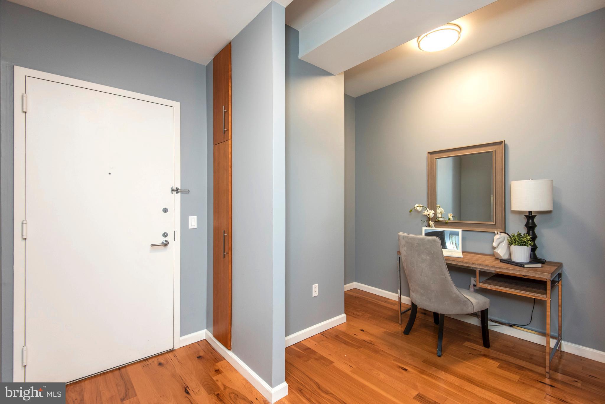 1425 Locust Street, Unit 4F Philadelphia, PA 19102 - Photo 13 of 34 a workspace with furniture and wooden floor