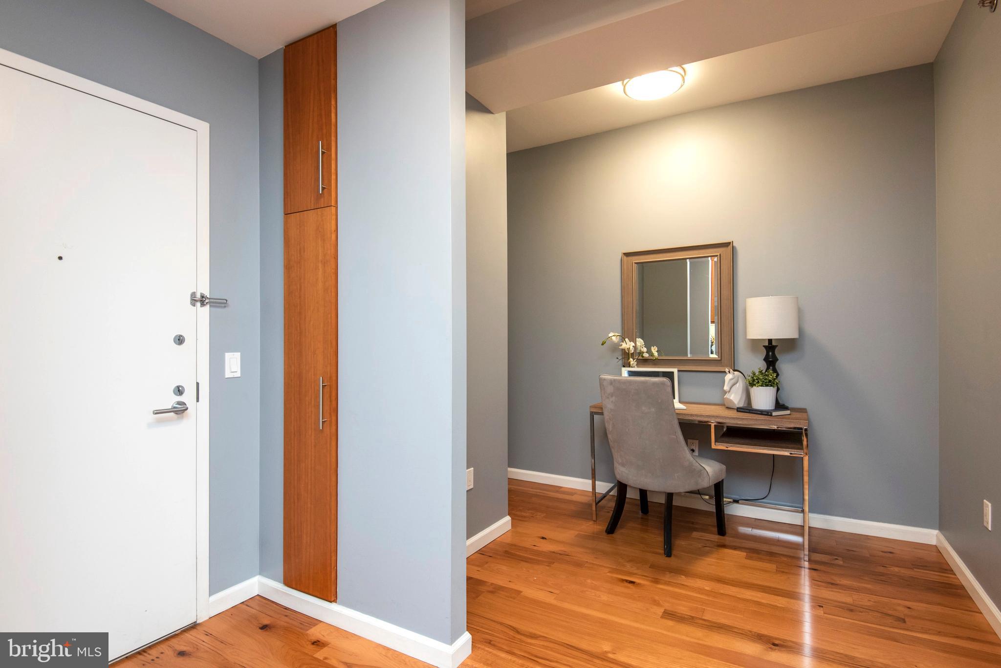 1425 Locust Street, Unit 4F Philadelphia, PA 19102 - Photo 14 of 34 a workspace room with furniture and wooden floor