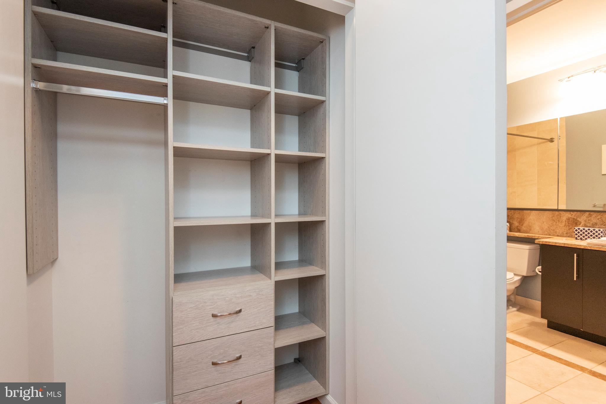 1425 Locust Street, Unit 4F Philadelphia, PA 19102 - Photo 17 of 34 a view of walk in closet with empty racks