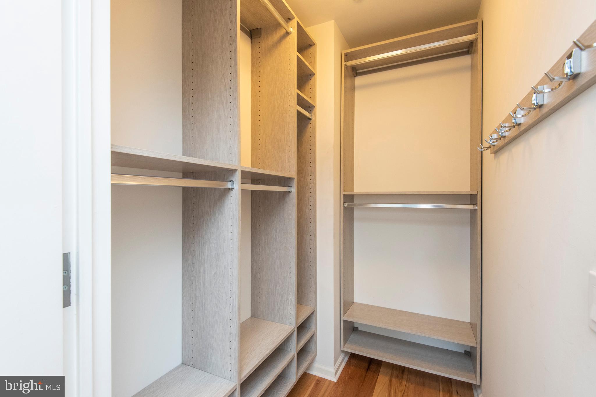 1425 Locust Street, Unit 4F Philadelphia, PA 19102 - Photo 26 of 34 a view of walk in closet with empty racks