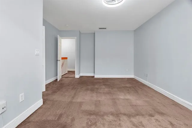 a view of a room with racks on the wall