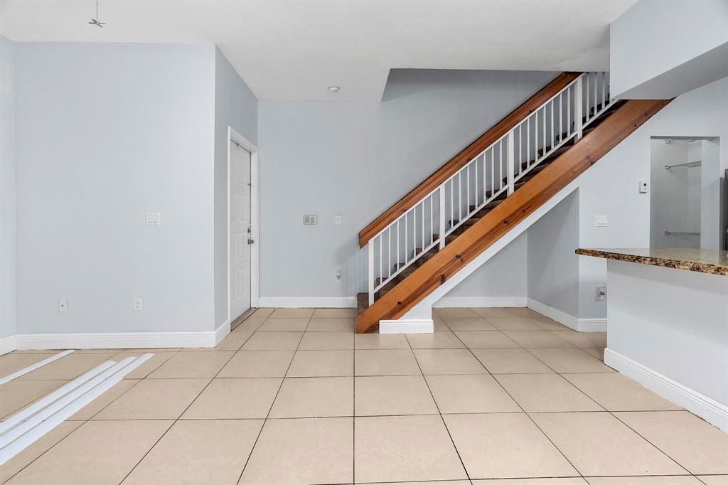 18352 Northwest 68th Avenue, Unit M Hialeah, FL 33015 - Photo 9 of 28 a view of an entryway with staircase