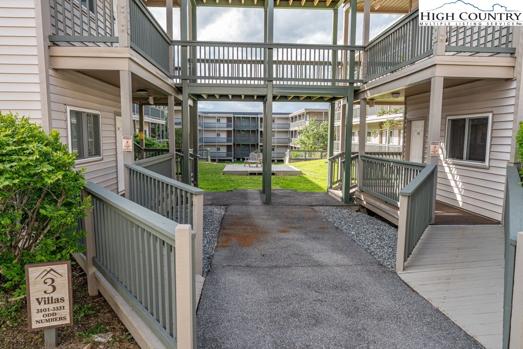 301 Pinnacle Inn Road, Unit 3204B Beech Mountain, NC 28604 - Photo 2 of 33 a view of a house with backyard and porch