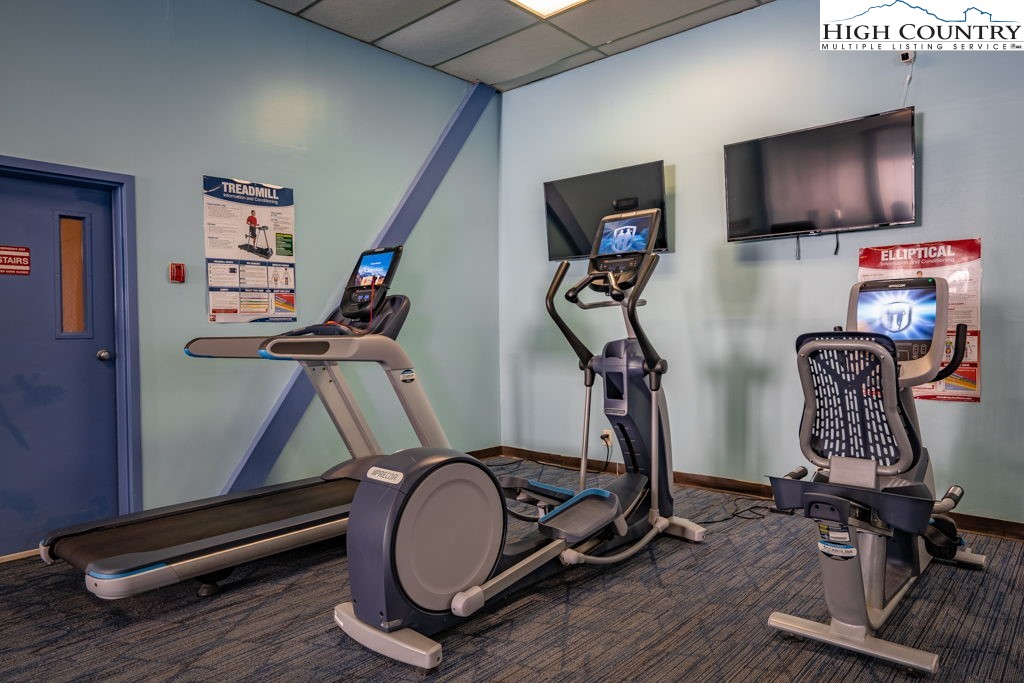 301 Pinnacle Inn Road, Unit 3204B Beech Mountain, NC 28604 - Photo 25 of 33 a room with gym equipment and windows