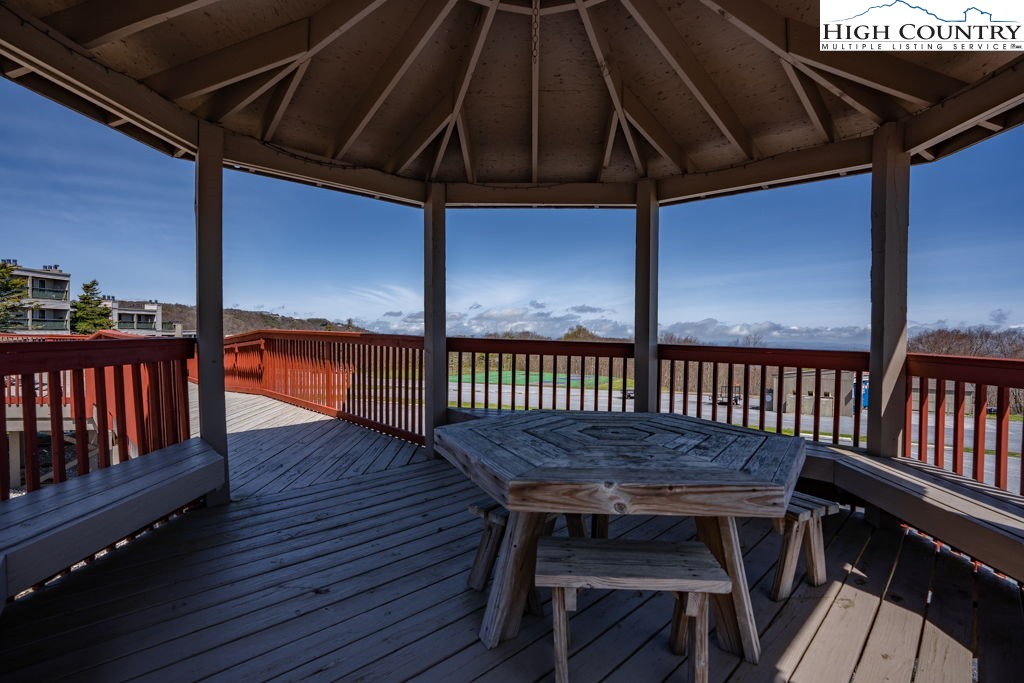 301 Pinnacle Inn Road, Unit 3204B Beech Mountain, NC 28604 - Photo 29 of 33 a view of a roof deck with wooden floor
