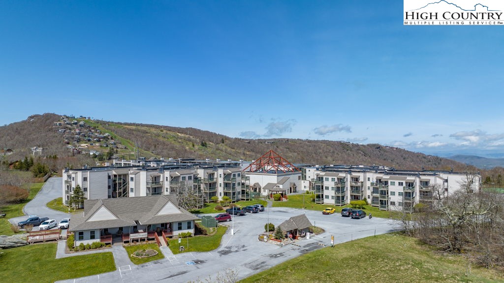 301 Pinnacle Inn Road, Unit 3204B Beech Mountain, NC 28604 - Photo 32 of 33 a view of a patio with swimming pool table and chairs