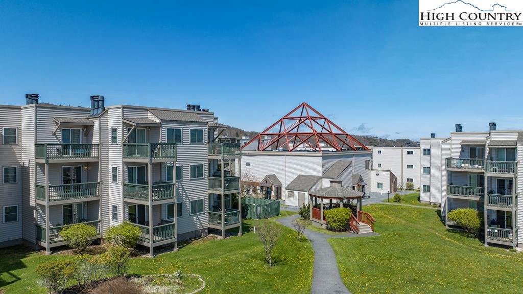 301 Pinnacle Inn Road, Unit 3204B Beech Mountain, NC 28604 - Photo 33 of 33 a view of a big yard in front of a building