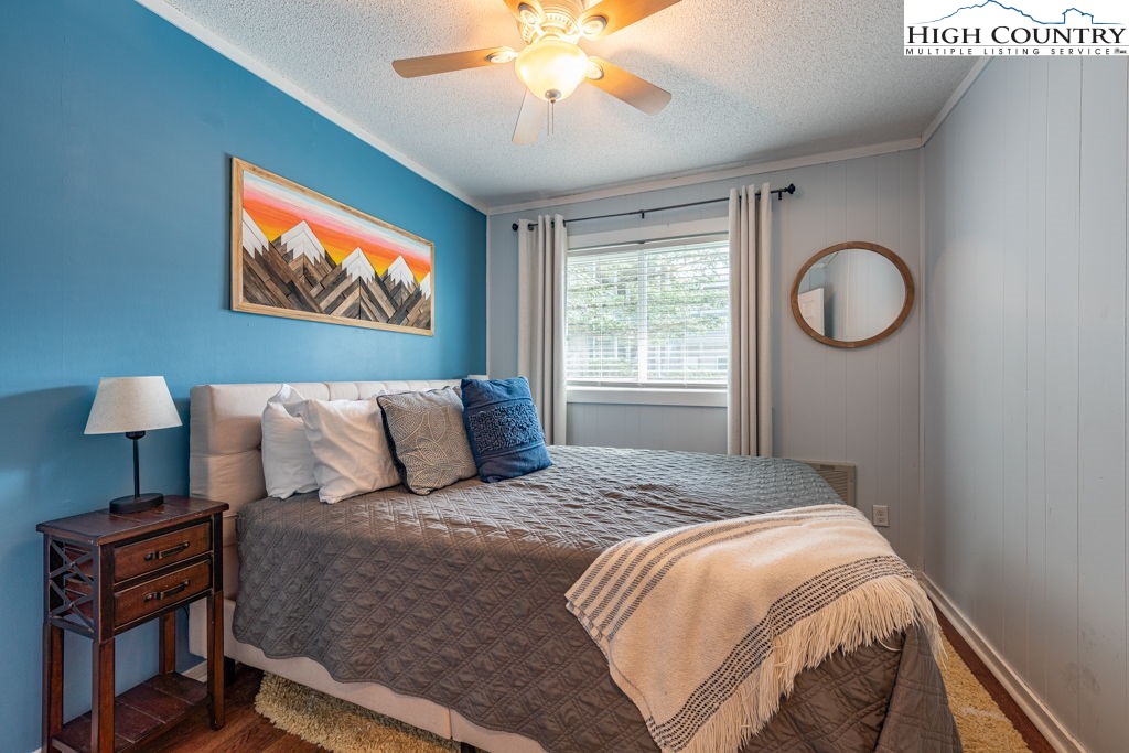 301 Pinnacle Inn Road, Unit 3204B Beech Mountain, NC 28604 - Photo 7 of 33 a bed sitting in a bedroom next to a window