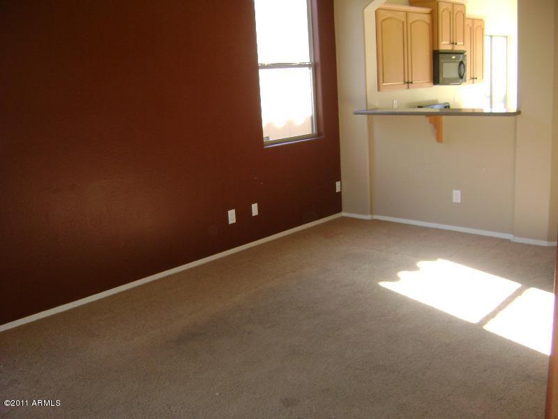8717 West Cordes Road Tolleson, AZ 85353 - Photo 3 of 22 living room 2