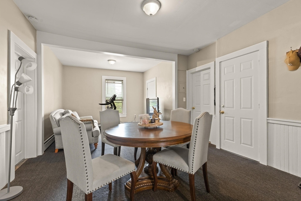 245 Rantoul Street Beverly, MA 01915 - Photo 8 of 12 a view of a dining room with furniture and wooden floor
