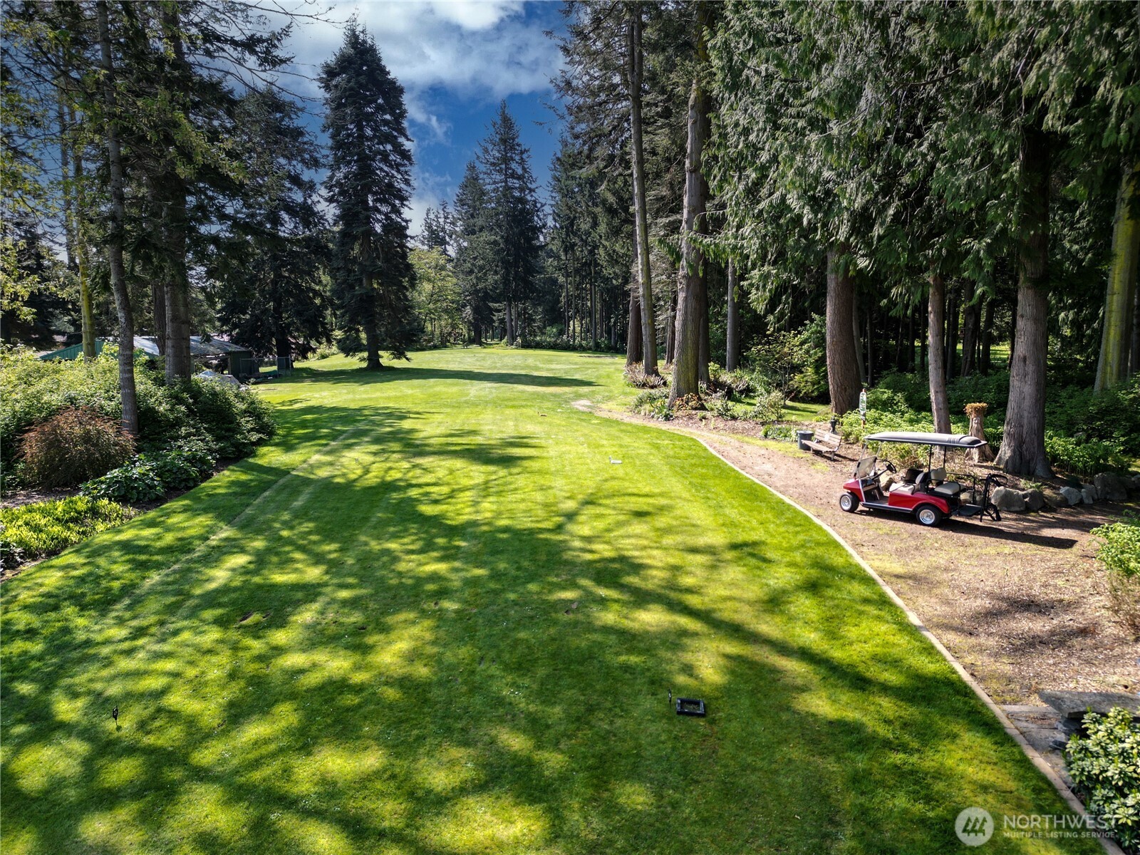 74 M Skagit Way Hat Island, WA 98201 - Photo 23 of 31 a swimming pool with outdoor seating and yard