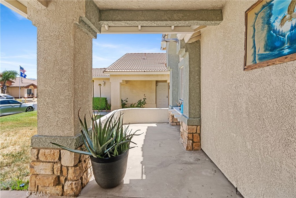 2906 Summer Set Circle Banning, CA 92220 - Photo 4 of 43 a view of a living room and a potted plant