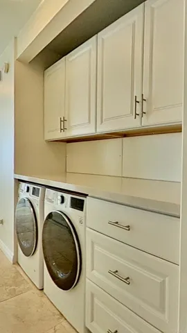 a view of a swimming pool with outdoor seating