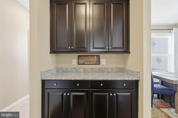 a spacious bedroom with a bed and furniture