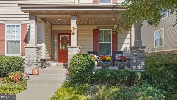 a view of a chairs and table in a patio