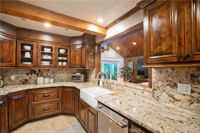 a kitchen with a sink and cabinets