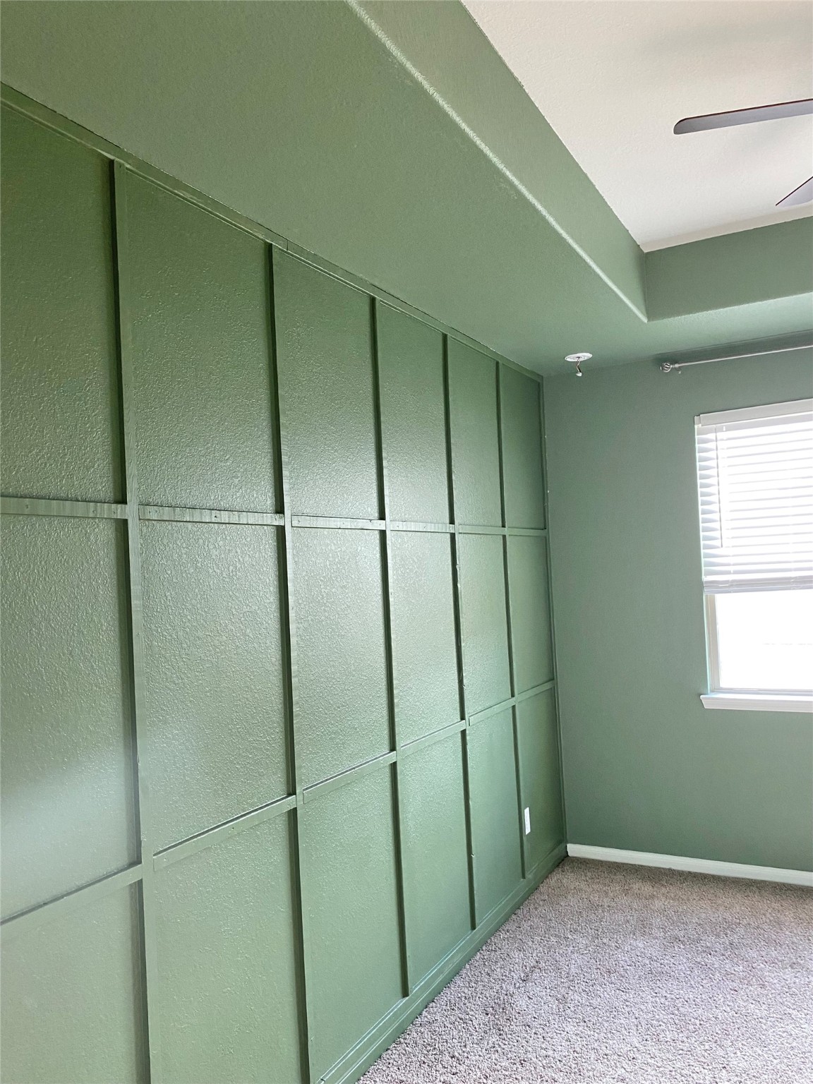 14223 Grand Hills Drive Conroe, TX 77303 - Photo 11 of 18 primary bedroom accent wall