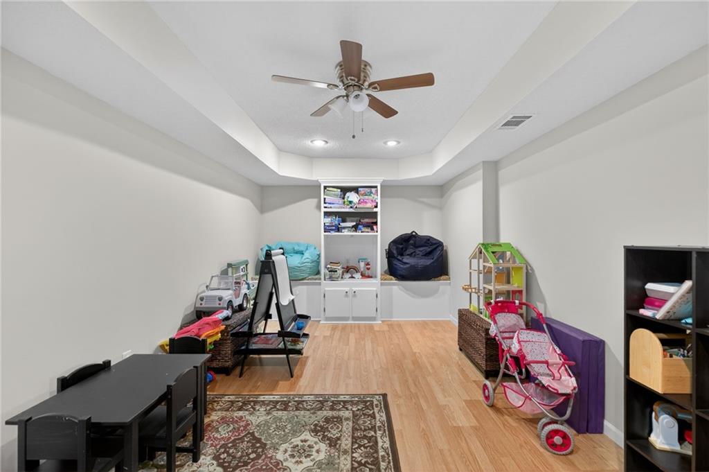 143 Autumn Run Place Villa Rica, GA 30180 - Photo 23 of 30 a bed room with a bed mirror and a window