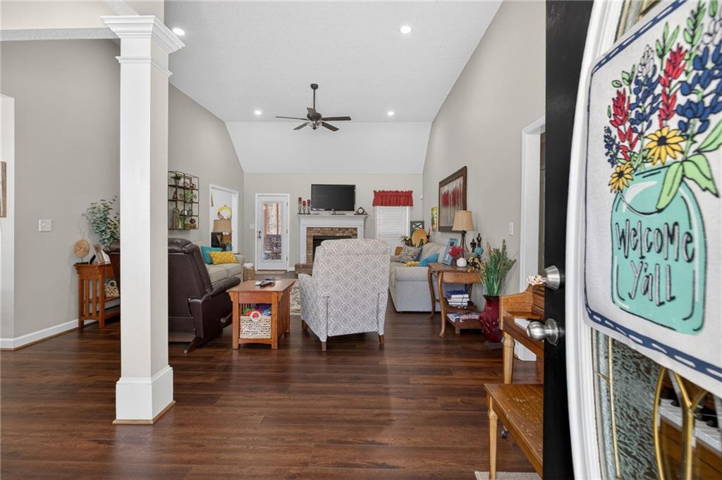 143 Autumn Run Place Villa Rica, GA 30180 - Photo 8 of 30 a living room with furniture and wooden floor