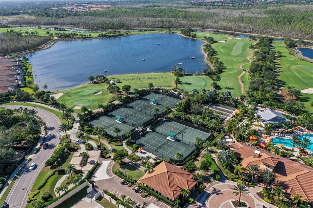 8777 Bellano Court, Unit 101 Naples, FL 34119 - Photo 37 of 39 an aerial view of a houses with outdoor space and parking