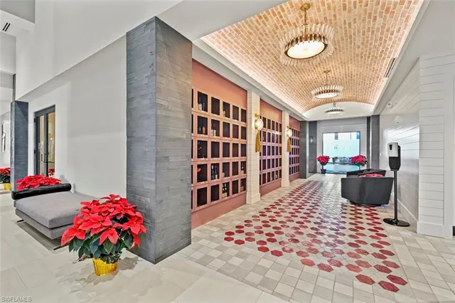 a bedroom with furniture and a book shelf
