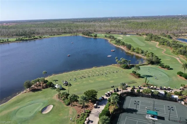 an aerial view of a houses with outdoor space