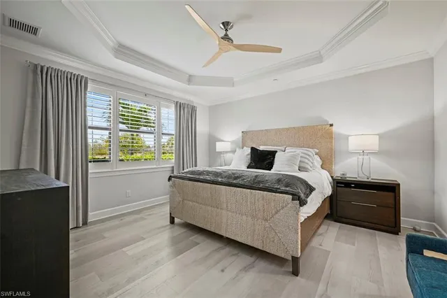 a bed room with a bed and a window