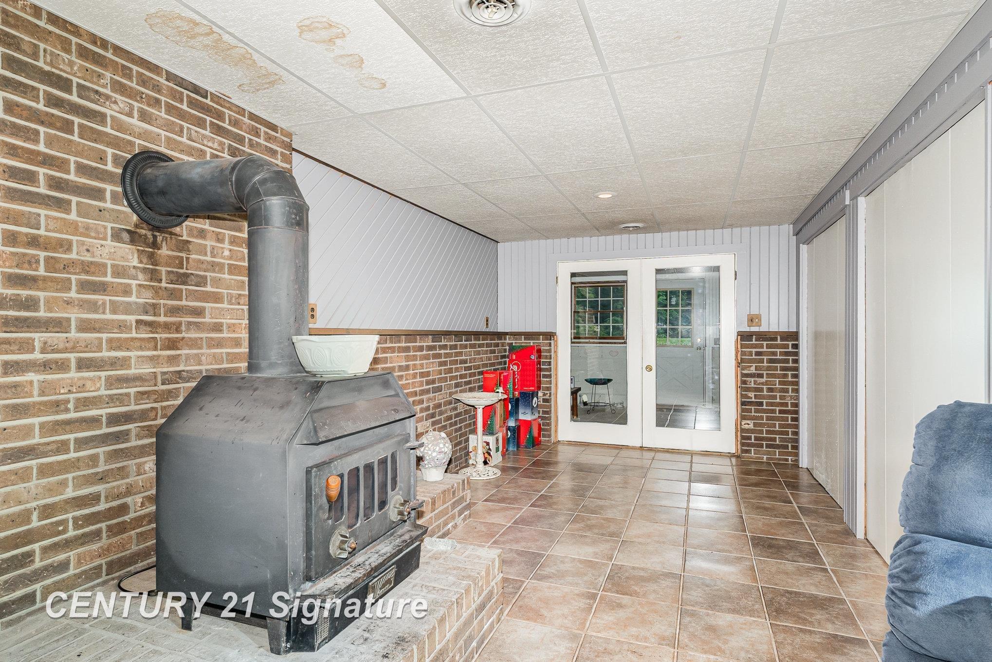 15521 Ithaca Road St. Charles, MI 48655 - Photo 17 of 33 Wood burning fireplace