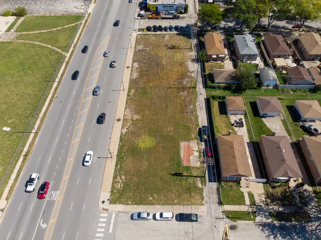 an aerial view of residential house with an outdoor space