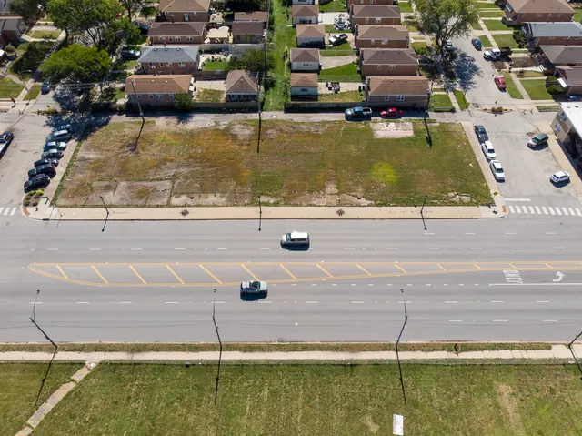 a view of swimming pool with a yard