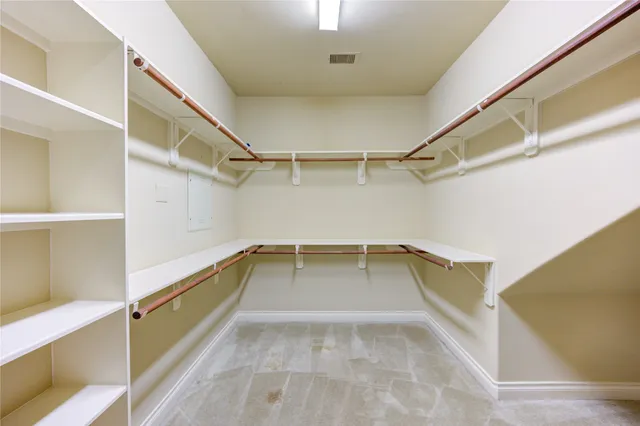 a view of a room with racks on the wall