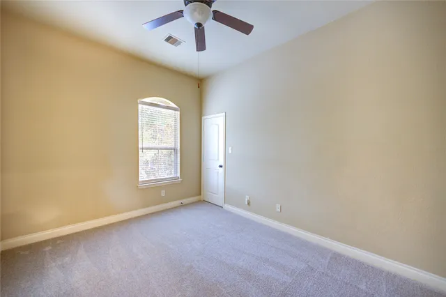 en empty room with windows