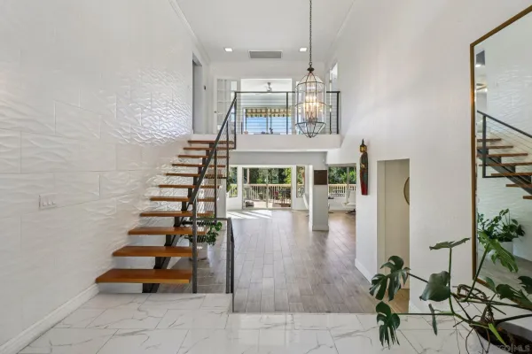 a view of a lobby with black and white walls