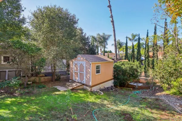 a backyard of a house with lots of green space