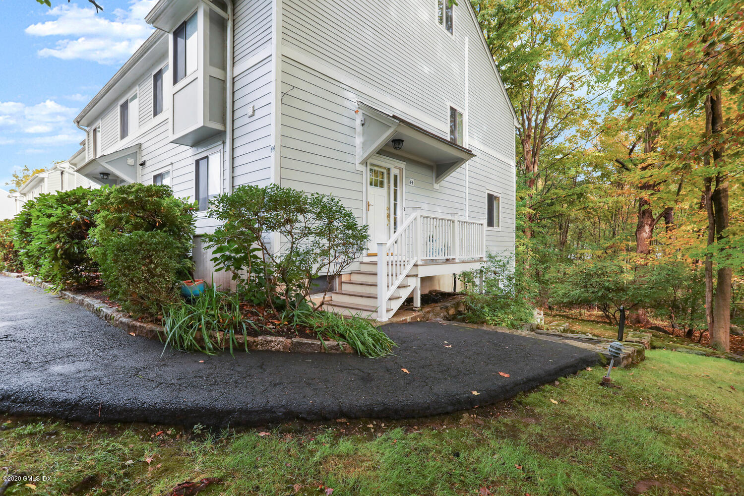44 Stirrup Lane, Unit 44 Riverside, CT 06878 - Photo 38 of 38 a view of a house with a yard and large tree