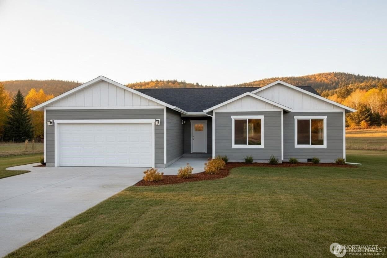 597 Brown Road East Chehalis, WA 98532 - Photo 2 of 17 a view of a house with a yard and fence