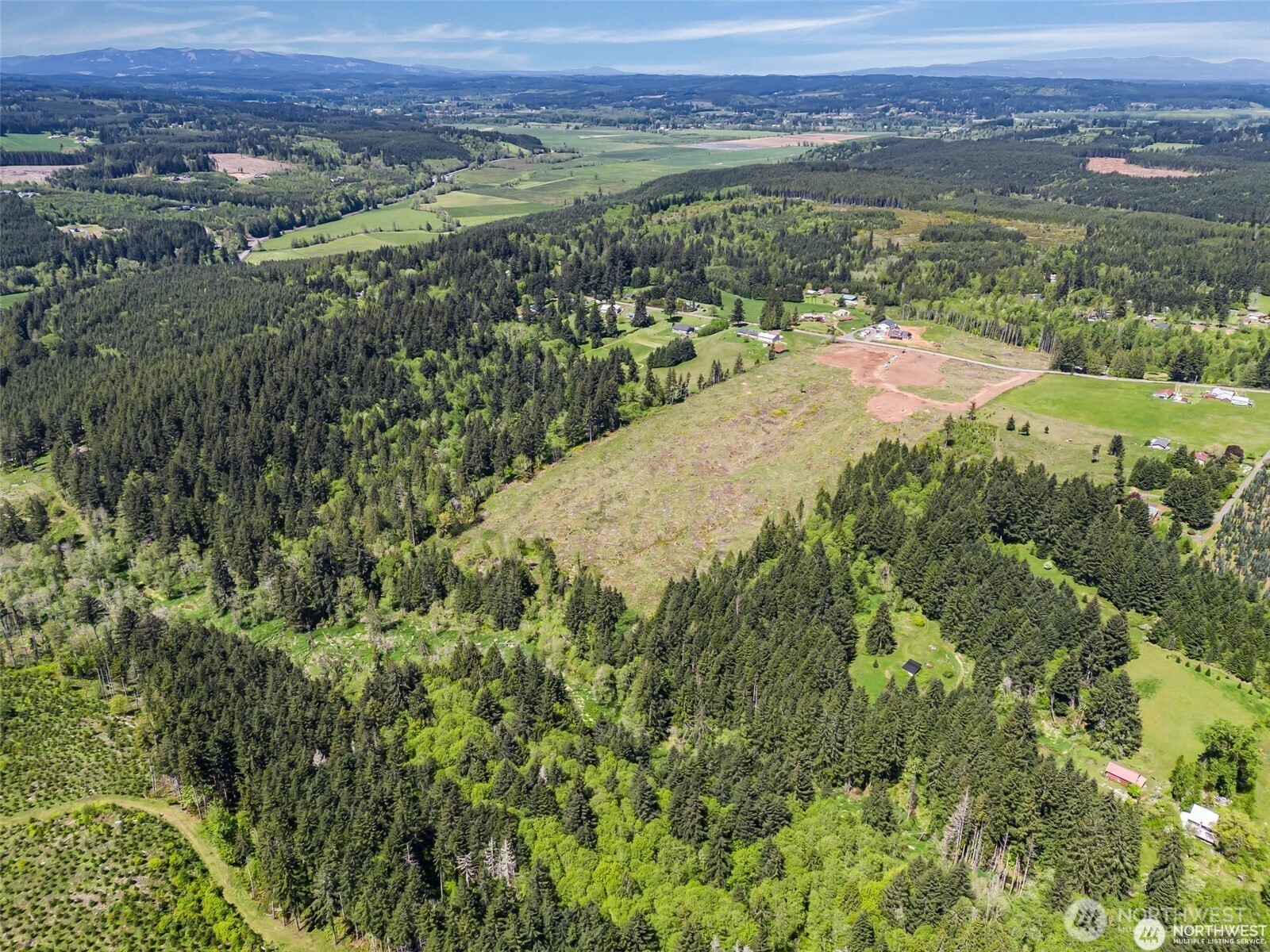 597 Brown Road East Chehalis, WA 98532 - Photo 8 of 17 a view of a field with an ocean view