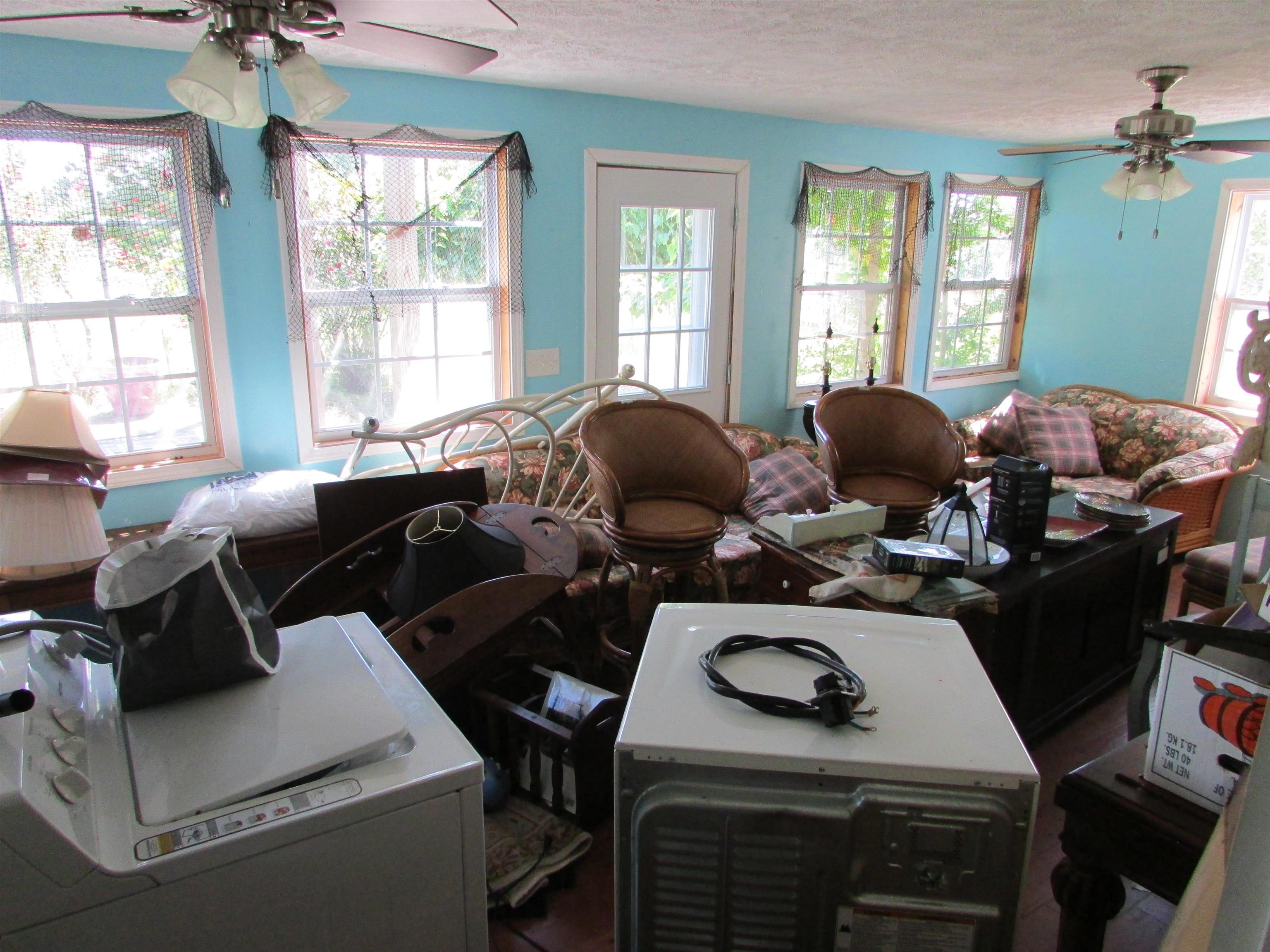 139 Plunk Drive Adamsville, TN 38310 - Photo 17 of 25 a living room with furniture and a window
