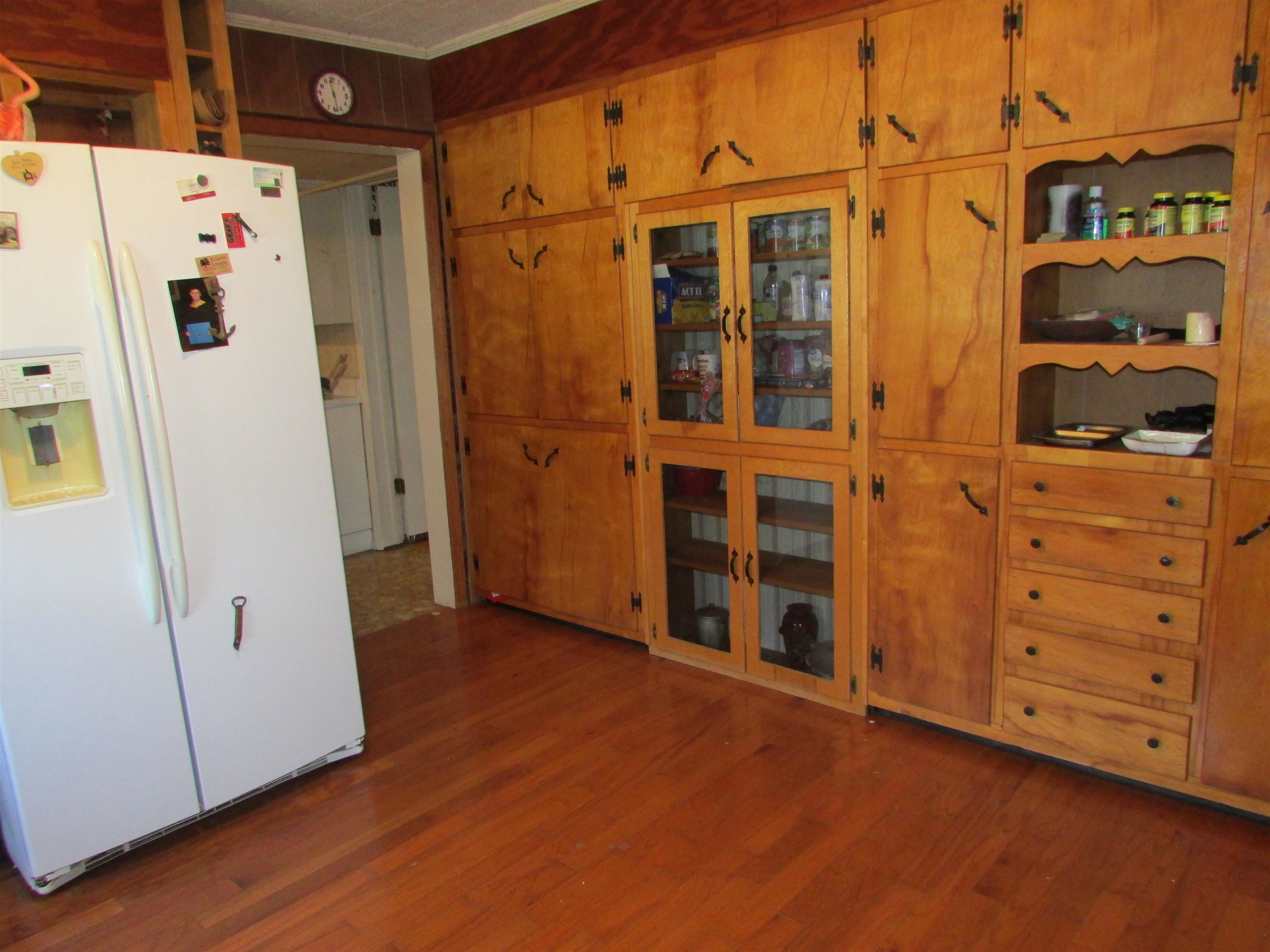 139 Plunk Drive Adamsville, TN 38310 - Photo 4 of 25 a view of a storage & utility room with closet empty shelves